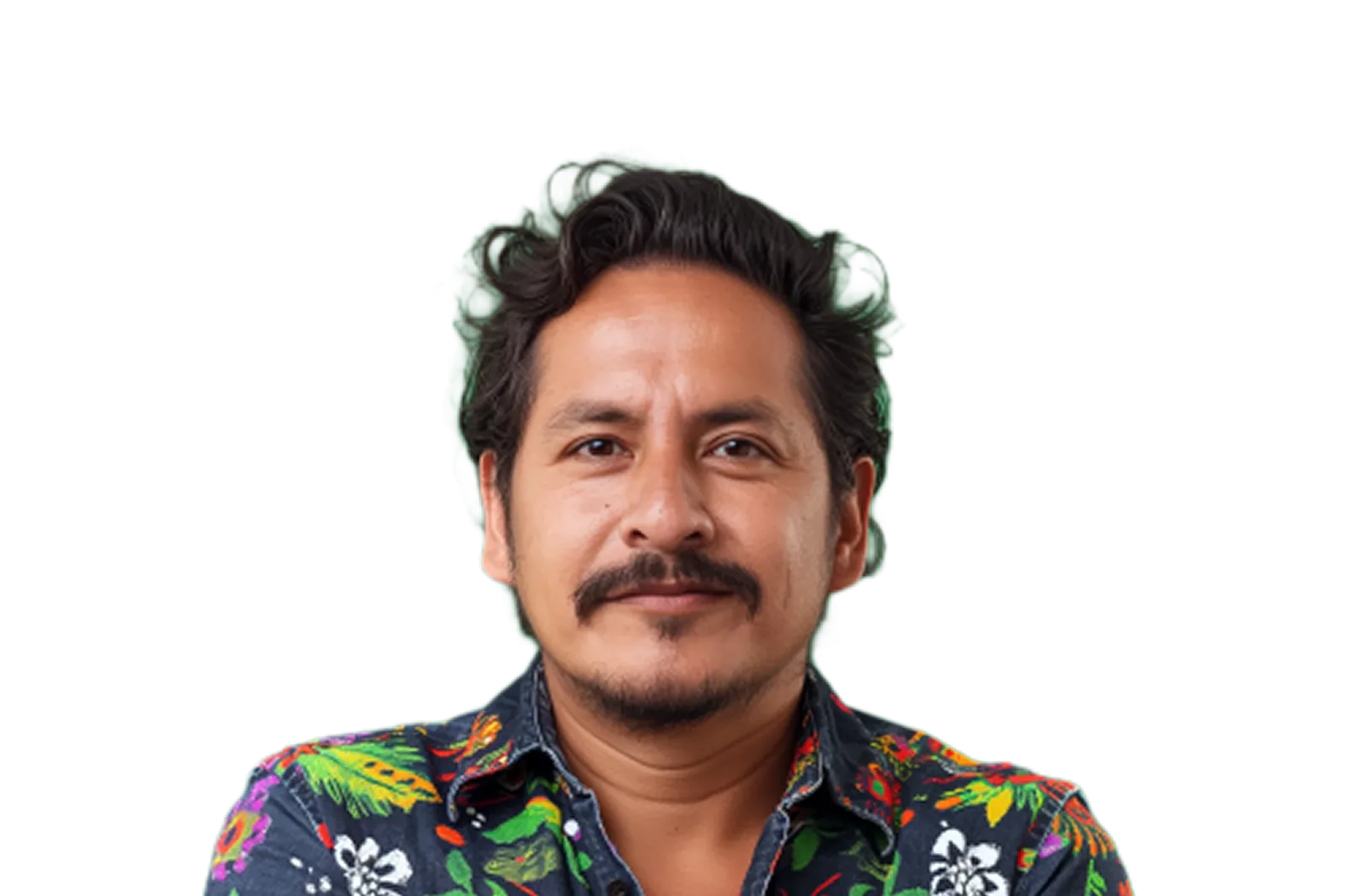 Man with dark wavy hair and mustache wearing a colorful floral shirt looking at the camera.